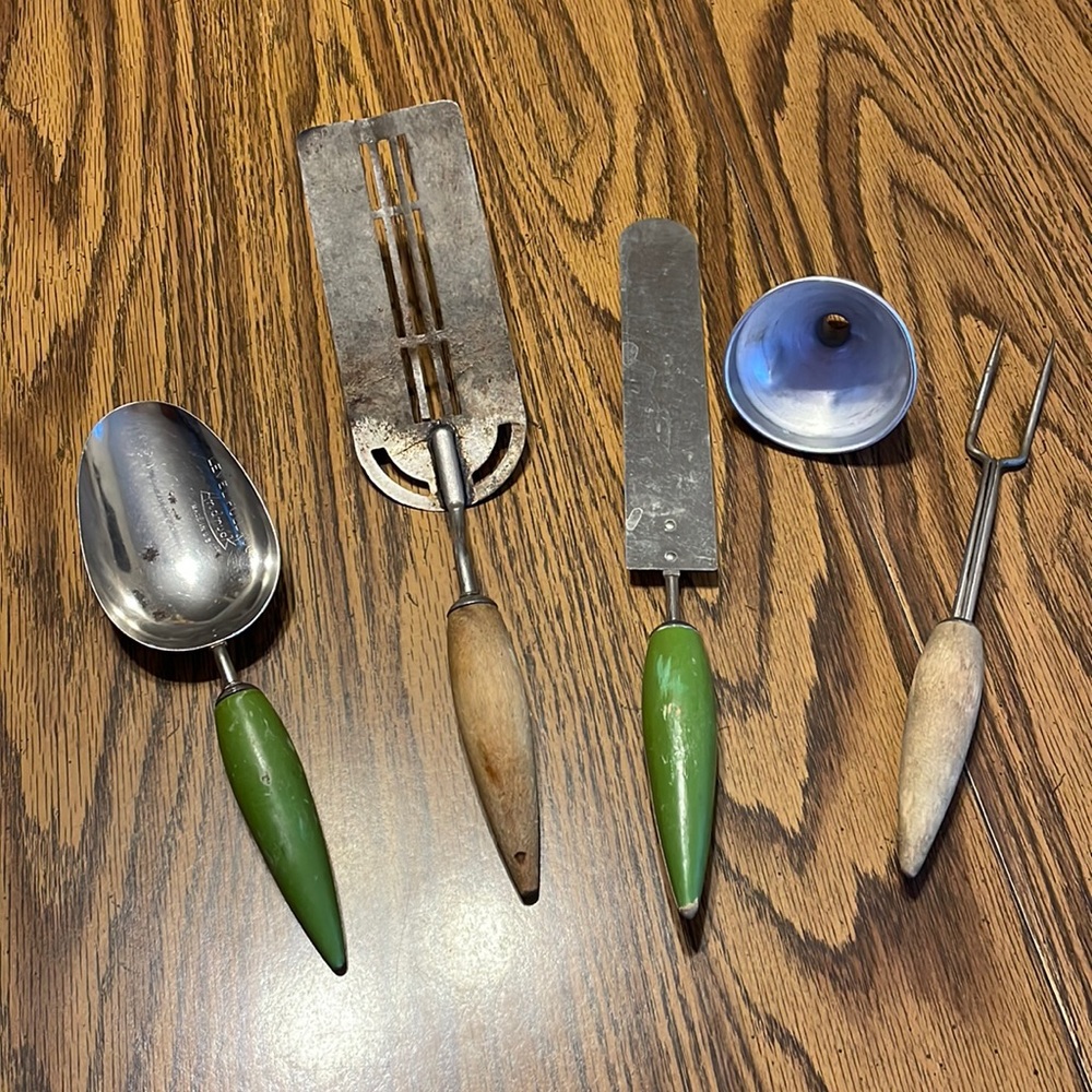 Vintage green and wooden handle kitchen utensils